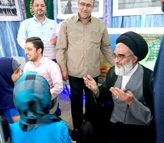 Presence of AYATOLAH Seyed Mohamad Saedi the trusteeship of Hazrat Masomeh (SA) in holy shrine's stand in Karbala martyrdom exhibition