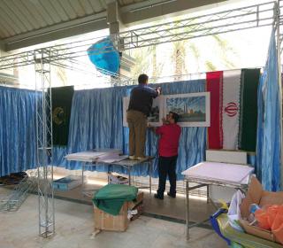Preparing of holy shrine stand in international martyrdom exhibition( Karbala)